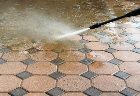 A patio being jet washed in Radley.