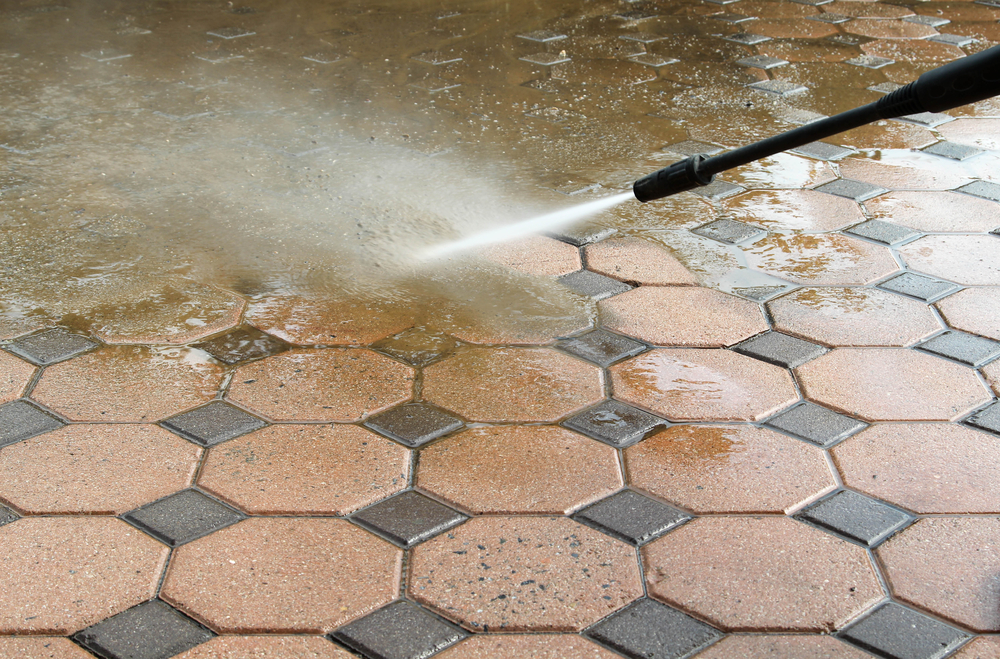 A patio being jet washed in Radley.