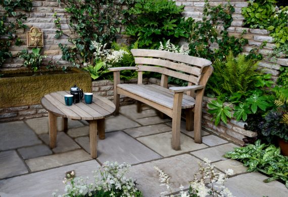 Small Garden Patios- a picturesque chair and table with accompanying.